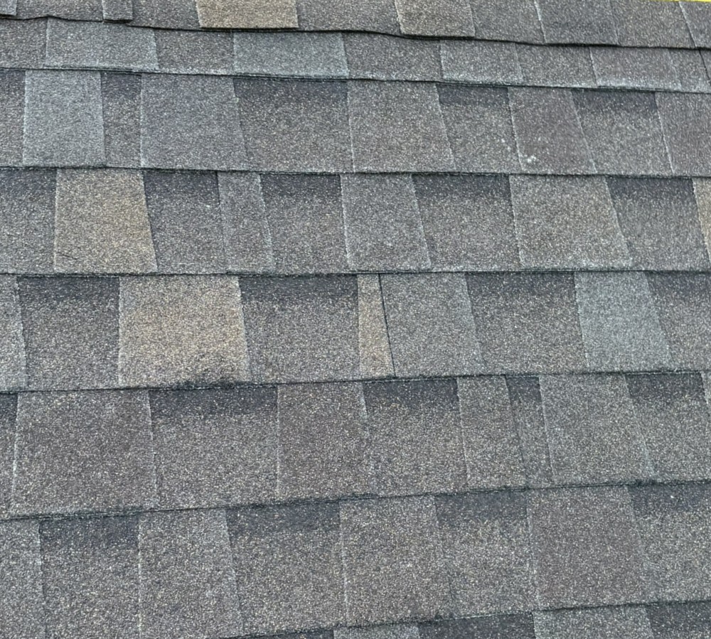 close-up of grey asphalt shingles