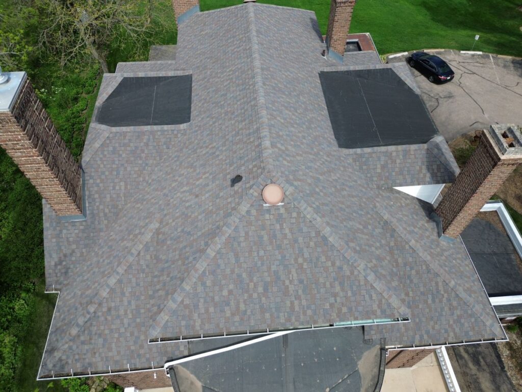 Aerial view of a grey shingle roof