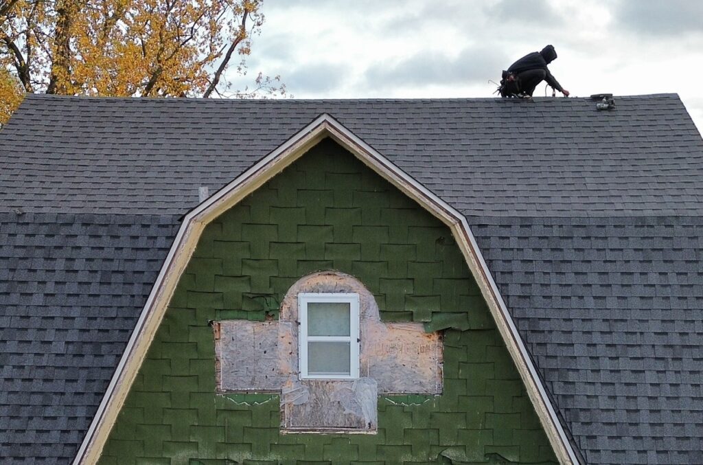Lauren Exteriors team working on a roof
