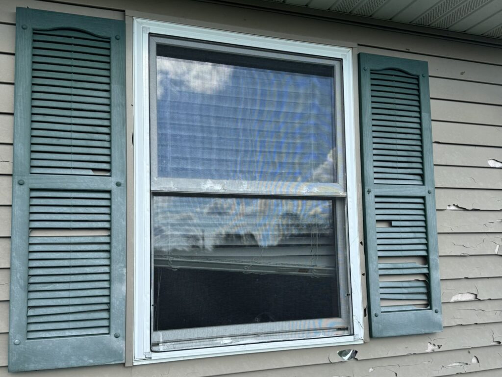 siding replacement cost white frame wall siding damaged