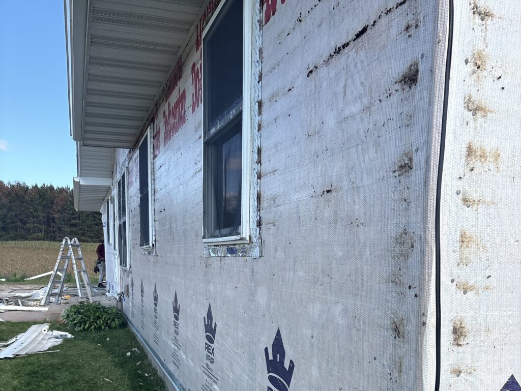 siding repairpaper around wall